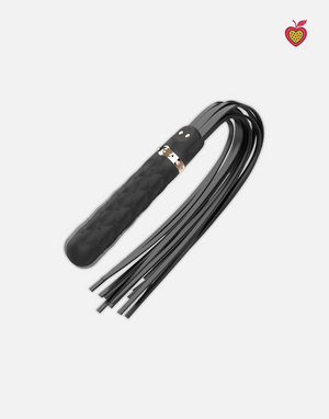 ONYX Vibrating Flogger in Obsidian Glow by Passion Wassion, an elegant adult toy blending sensory vibration and gentle impact for exciting pleasure play.
