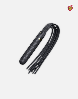 ONYX Vibrating Flogger in Obsidian Glow by Passion Wassion, an elegant adult toy blending sensory vibration and gentle impact for exciting pleasure play.